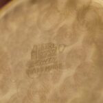 Dettaglio incisione cassa di chiusura di orologio Zenith in oro rosa