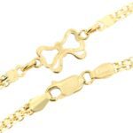 zoom dettaglio particolare chiusura e fiocco di collana oro giallo