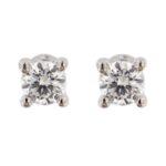 Orecchini punto luce in oro bianco 18 kt con diamante taglio brillante da 0.08 ct cad totale 0.16 ct Colore E-F Purezza VS. Chiusura a perno e farfallina.
