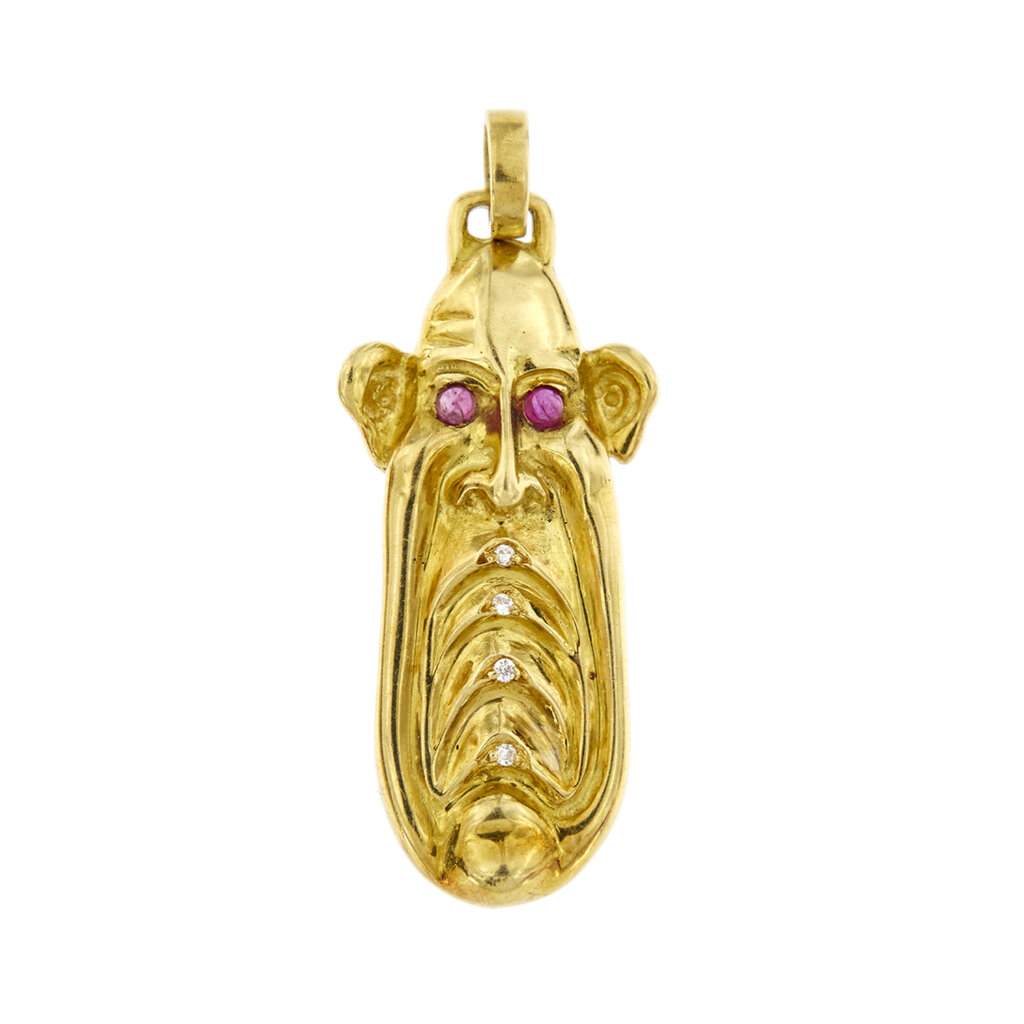 Face pendant with rubies and diamonds