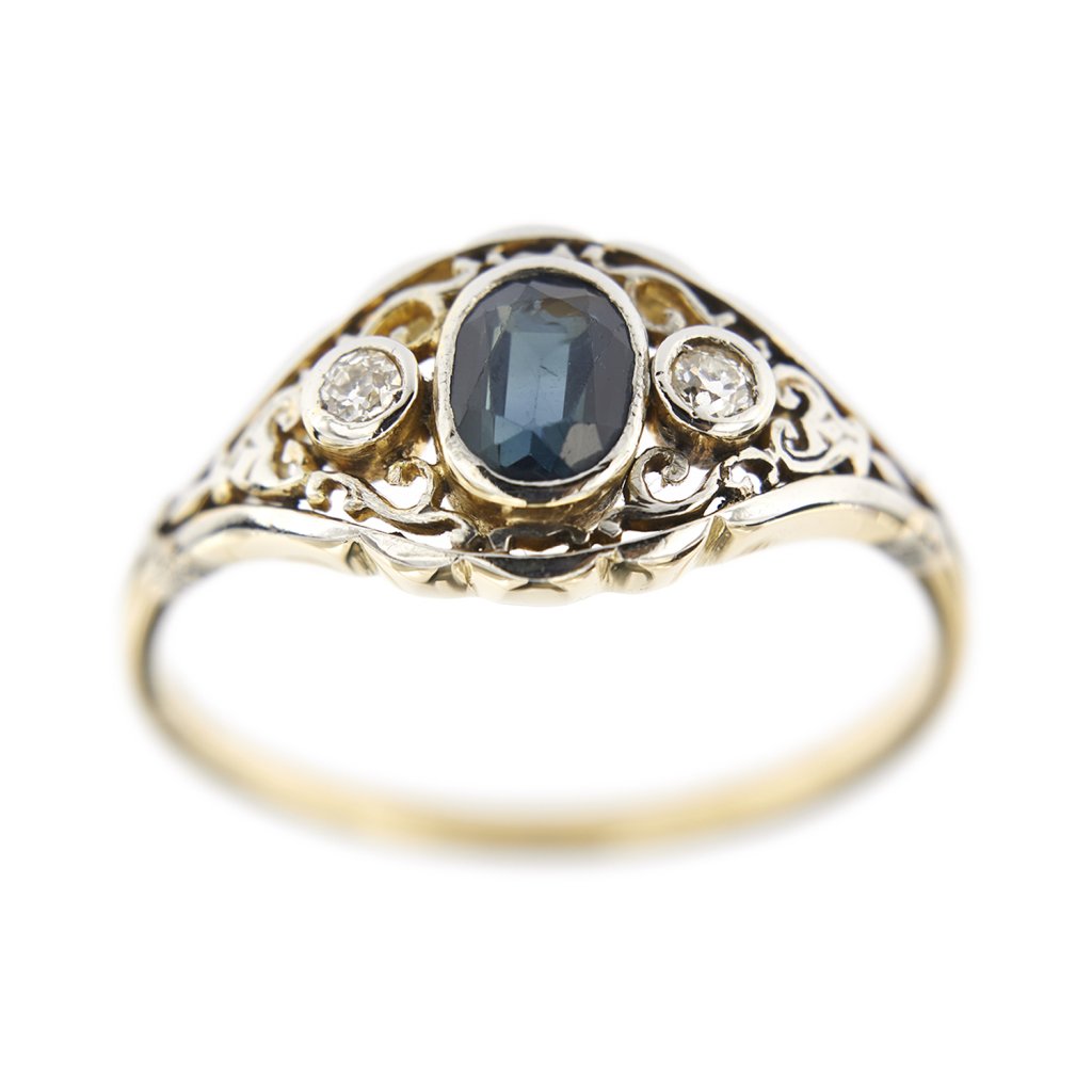 Perforated ring with sapphire and diamonds