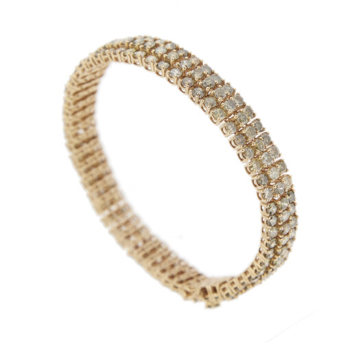 Bracciale tennis in oro rosa 18 kt con 171 diamanti taglio brillante d 0.05 ct cad. totale 8.55 ct disposti su tre file, di varie sfumature di colore da trasparente a brown, green e yellow e purezza VS-SI.