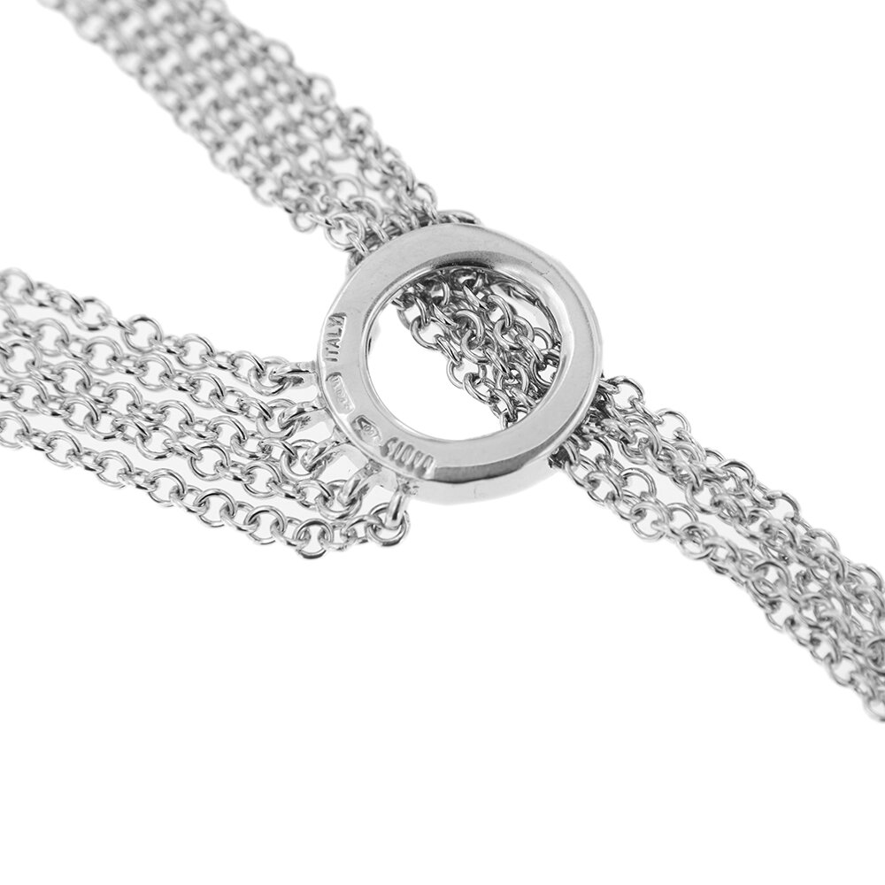 Zoom retro lato diamanti di collana multifilo oro bianco con diamanti e cinque sfere pendenti in movimento brand Nanis