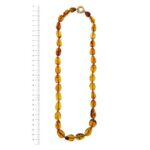 collana oro ambra foto paragone righello per misura gioiello lunghezza in centimetri