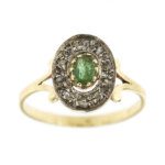 Anello 2 ori, oro giallo e bianco 18 kt con smeraldo naturale ovale da 0.50 ct con intorno 10 diamanti taglio rosette da 0.02 ct cad. totale 0.20 ct , gambo lavorato.