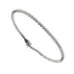 Bracciale tennis in oro bianco 18 kt con 64 diamanti taglio brillante da 0,03 ct cad. totale 1,92 ct - colore GH e purezza VS; chiusura a cassetto con 2 sicure.