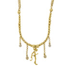 Collana in oro giallo 18 kt maglia rolò ricoperta da sfere con d'oro di dimensioni diverse con un pendente centrale della pantera rosa snodata e ai lati 4 pendenti maglia rolò con cerchietto finale in oro bianco lavorato e 4 diamanti taglio brillante da 0,01 ct cad, totale 0,04 ct - Colore FG e Purezza VS. La parte posteriore della collana è in maglia rolò doppia con gancio di chiusura a S, marca Gabriella Rivalta.