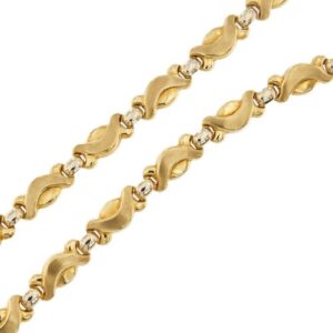 dettaglio maglia collana due ori collier