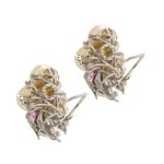orecchini con diamanti perle e pietre preziose in oro bianco