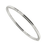 Bracciale rigido apribile in oro bianco 18kt con chiusura a cassetto.
