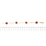 bracciale oro giallo con fiori fatti con corallo rosso foto paragone righello per misura gioiello lunghezza in cm