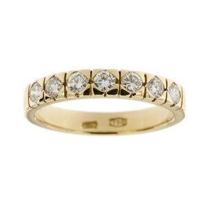 Anello riviere in oro giallo 18kt con 7 diamanti taglio brillante da 0.08 ct cad., totale 0.56 ct - colore FG e purezza VS.