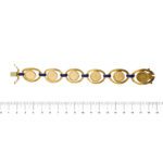 bracciale oro giallo vintage smaltato e con 6 monete messicane foto paragone righello per misura gioiello lunghezza