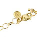 zoom dettaglio incisione brand di collana oro giallo con fiore smaltato a fuoco con pietre preziose brand Gabriella Rivalta