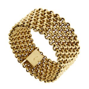 Bracciale a fascia in oro giallo 18kt con maglia intrecciata, lucida e lavorata, chiusura, a scomparsa con sicura. Brand: Unoaerre.