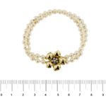 bracciale doppio filo con perle e fiore in oro giallo con diamanti foto paragone righello per misura gioiello in cm