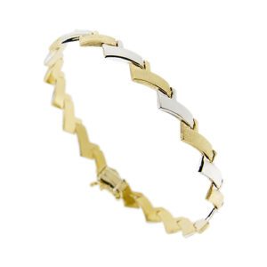Bracciale a segmenti obliqui alternati in oro giallo satinato e in oro bianco lucido 18kt con chiusura a cassetto con sicura.