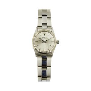 Orologio Rolex Oyster Perpetual in acciaio, referenza 6551, movimento automatico, cassa in acciaio 31 mm, bracciale oyster ghiera in oro bianco zigrinata, quadrante silver con indici, vetro plastica, chiusura deployante, anno 1970. Brand: Rolex.