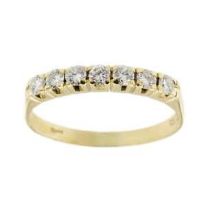 Anello riviere in oro giallo 18kt con 7 diamanti taglio brillante: 3 da 0,06 ct cad. e 4 da 0,05 ct cad. totale 0,38 ct - colore FG e purezza VS.