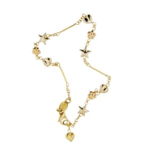 bracciale in oro giallo con inserti tre ori: cuori, fiori e stelle