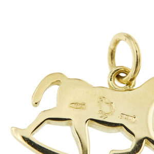 zoom dettaglio punzoni oro Dodo