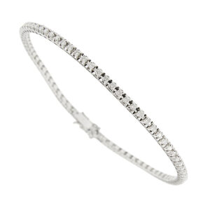 Bracciale tennis in oro bianco 18kt con 77 diamanti taglio brillante da 0,02 ct cad. totale 1,54 ct - colore GH e purezza VS; chiusura a cassetto con sicure.