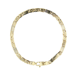 Bracciale in oro giallo e oro bianco 18kt, maglia occhio di tigre alternata, piatta e rigata, placchetta con logo e chiusura a moschettone. Brand: Unoaerre.