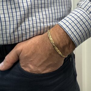 Foto gioiello indossata: bracciale uomo due ori Unoaerre