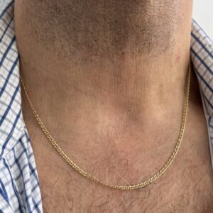 Foto gioiello indossata: collana maglia traversino catena uomo in oro giallo