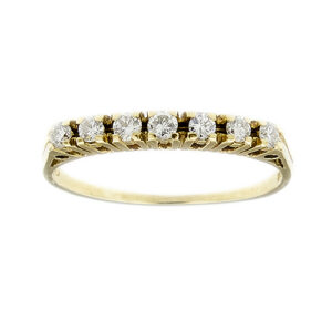 Anello riviere in oro giallo 18kt con 7 diamanti taglio brillante: 3 da 0.04 ct cad e 4 da 0.03 ct cad, totale 0.24 ct, colore GH - purezza VS.