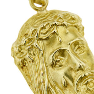 zoom dettaglio ciondolo oro giallo volto di Gesù