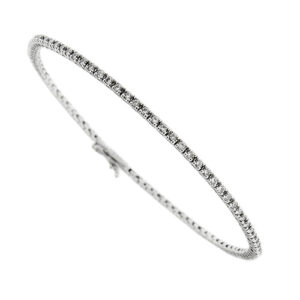 Bracciale tennis in oro bianco 18kt con 87 diamanti taglio brillante da 0.01 ct cad, totale 0.87 ct colore GH - purezza VS; chiusura a scomparsa con sicura.