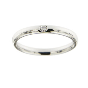 Anello fede in oro bianco 18kt con diamante taglio brillante da 0.03 ct. Brand: Pomellato.