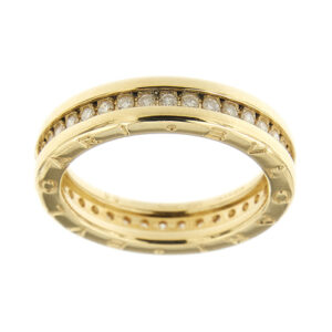 Anello in oro giallo 18, fede eternelle a una fascia con diamanti della collezione B.zero1 di Bvlgari. Misura 55 (0,51 ct).