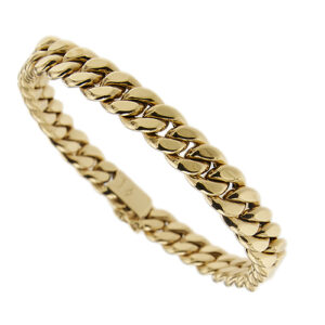 Bracciale in oro giallo 18 kt maglia grumette bombata, chiusura a scomparsa con sicura.