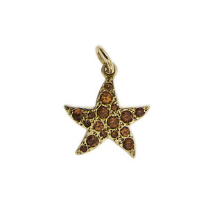 Ciondolo Dodo animalier in oro giallo 18 kt a forma di stella marina con zaffiri arancioni significato/messaggio: "CHI MI TROVA E' FELICE", collezione Rainbow, brand: Dodo.